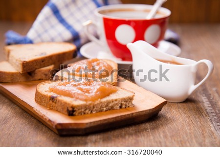 fresh apple  marmalade on the bread with tea