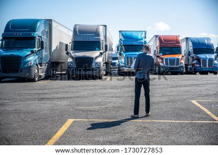 Similar – Image, Stock Photo Lots of Trucks and cars on a Highway