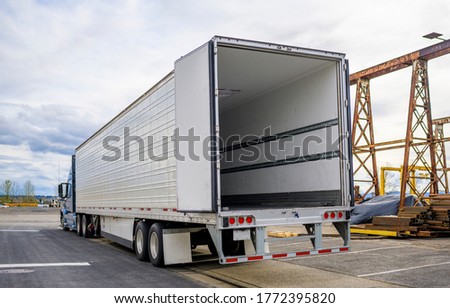 Similar – Image, Stock Photo opened warehouse door with unexpected noble blue curtain