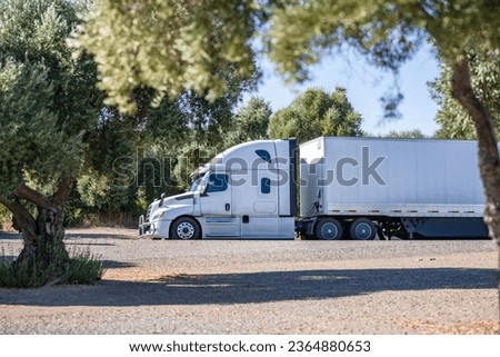 Similar – Image, Stock Photo Tractor with trailer standing in front of a white wall