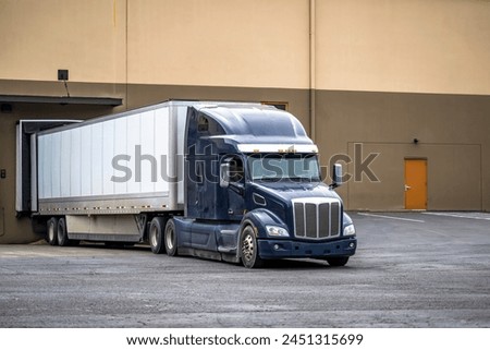 Similar – Image, Stock Photo Tractor with trailer standing in front of a white wall