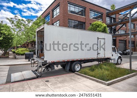 Similar – Image, Stock Photo Tractor with trailer standing in front of a white wall