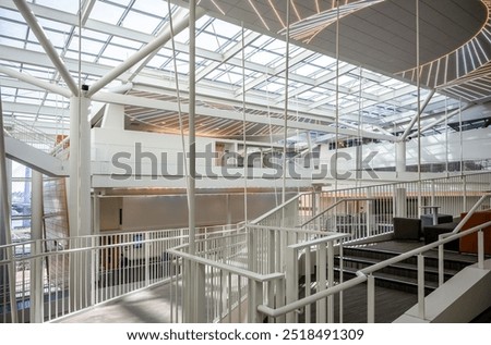 Similar – Image, Stock Photo Suspended concrete elements on the load hook of a crane