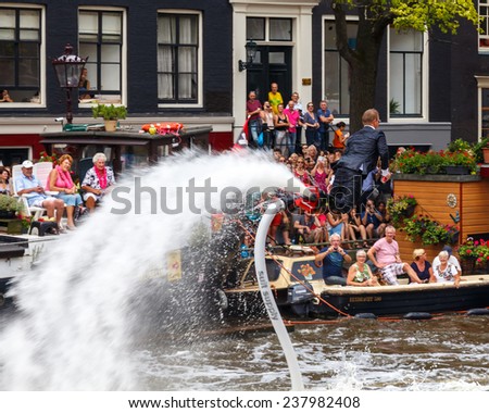 Amsterdam, Netherlands - August 2, 2014: participants in the annual event for the protection of human rights and civil equality -  Gay Pride.