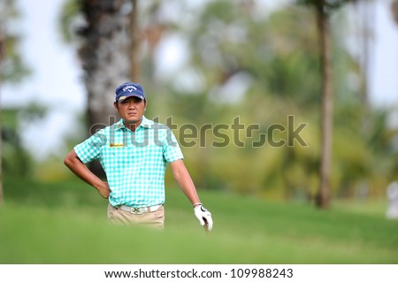 NAKHONPATHOM,THAILA ND - AUG 10:Danny Chia of MAL lines up a shot during hole18 day two of the Golf Thailand Open at Suwan Golf&Country Club on August 10, 2012 in Nakhonpathom Thailand