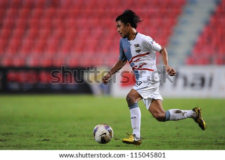 BANGKOK THAILAND-SEP15: Assaming Mae of Insee Police Utd.control the ball during Thai Premier League between BBCU F.C. and Insee Police Utd.at Rajamangala stadium on Sep15, 2012 in Thailand.