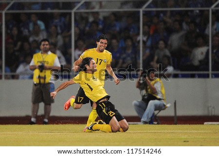 CHONBURI,THAILAND-OCTOBER 23:Abdul-Amir (no.25) of Arbil S.C.(IRQ) in action during the AFC CUP  between Chonburi F.C.and Arbil S.C.(IRQ) at Chonburi Stadium on Oct 23,2012 in Thailand