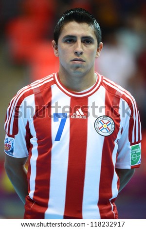 BANGKOK,THAILAND-NOVEMBER4:Oscar Velazquez of Paraguay looks on during the national anthem the FIFA Futsal World Cup between Paraguay and Costa Rica at Indoor Stadium Huamark on Nov4,2012 inThailand.