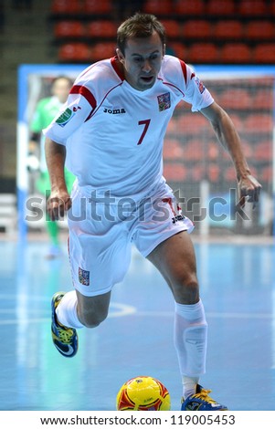 BANGKOK,THAILAND-NOVEMBER 06:Lukas Resetar of Czech Republic runs with the ball during the FIFA Futsal World Cup  between Egypt and Czech Republic at Indoor Stadium Huamark on Nov6, 2012 in,Thailand.
