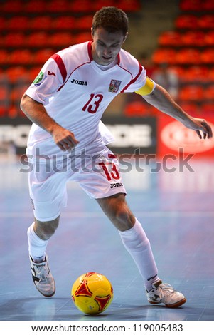 BANGKOK,THAILAND-NOVEMBER06:Islam Gamila of Czech Republic runs with the ball during the FIFA Futsal World Cup  between Egypt and Czech Republic at Indoor Stadium Huamark on Nov6, 2012 in,Thailand.