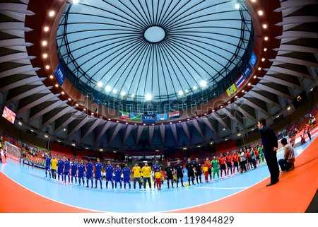 BANGKOK,THAILAND-NOVEMBER 09:Teams line up for the national anthem during  the FIFA Futsal World Cup between Kuwait and Egypt at Indoor Stadium Huamark on Nov9, 2012 in Bangkok, Thailand.
