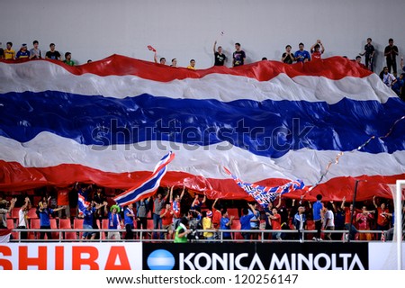BANGKOK THAILAND-NOVENBER 24:Unidentified of Thailand Flag supporters during the AFF Suzuki Cup between Thailand and Philippines at Rajamangala stadium on Nov24, 2012 in,Thailand.