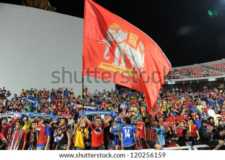BANGKOK THAILAND-NOVENBER 24:Unidentified fans of Thailand Flag supporters during the AFF Suzuki Cup between Thailand and Philippines at Rajamangala stadium on Nov24, 2012 in,Thailand.
