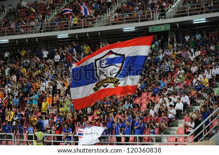 BANGKOK THAILAND-NOVEMBER 27:Unidentified of Thailand Flag supporters during the AFF Suzuki Cup between Thailand and Myanmar at Rajamangala stadium on Nov27, 2012 in Bangkok,Thailand.