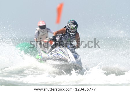 PATTAYA CITY THAILAND-DECEMBER 8:Dustin Motzouris of South Africa in action during moto2 class Pro Ski Open the Jetski  King\'s Cup World Cup Grand Prix at Jomtien Beach on Dec8, 2012 in,Thailand.