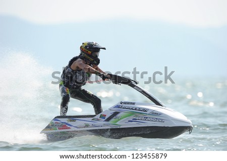 PATTAYA CITY THAILAND-DECEMBER 8:Dustin Motzouris of South Africa in action during moto2 class Pro Ski Open the Jetski  King\'s Cup World Cup Grand Prix at Jomtien Beach on Dec8, 2012 in,Thailand.