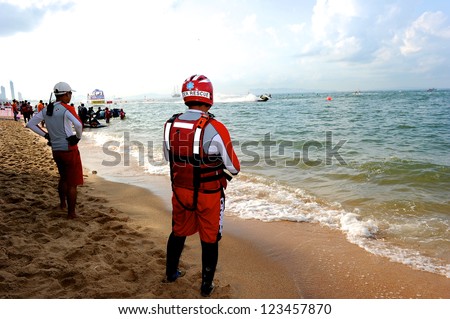 PATTAYA CITY THAILAND-DECEMBER8:Unidentified Water Rescue look on during the Jetski  King\'s Cup World Cup Grand Prix at Jomtien Beach on Dec8,2012 in,Thailand.