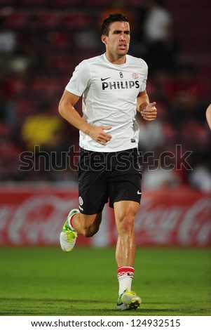 BANGKOK,THAILAND-JANUARY 8: Kevin Strootman of PSV in action during The AIA Champions Cup match between SCG Muangthong Utd. and PSV at SCG Stadium on Jan8 ,2012 in ,Thailand.