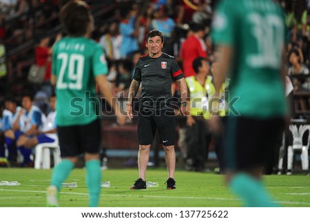 NONTHABURI,THAILAND-MAY01:Head Coach Mihailo Petrovic of Urawa Red Diamonds look on during theAFC Champions League between Muangthong Utd.and Urawa Red Diamonds at on May1,2013 in,Thailand.