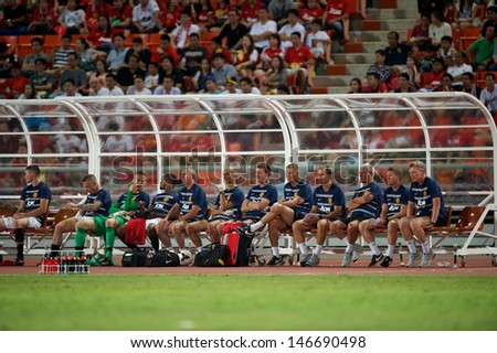 BANGKOK THAILAND-JULY13:Manager David Moyes (R) of Manchester United look on during the friendly match between Singha All Star and Manchester United at Rajamangala Stadium on July13,2013 in Thailand.