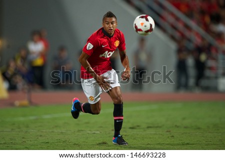 BANGKOK,THAILAND-JULY13: Jesse Lingard (R) of Manchester United in action during the friendly match between Singha All Star and Manchester United at Rajamangala Stadium on July 13, 2013 in Thailand.