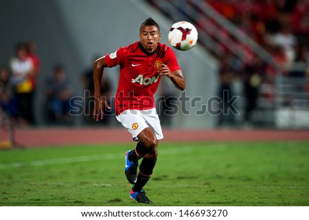 BANGKOK,THAILAND-JULY13: Jesse Lingard (R) of Manchester United in action during the friendly match between Singha All Star and Manchester United at Rajamangala Stadium on July 13, 2013 in Thailand.