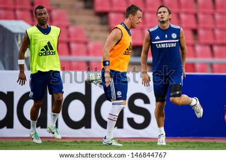 BANGKOK, THAILAND - JULY 16: Ashley Cole (L) and team-mate of Chelsea FC in action a Chelsea FC training session at Rajamangala Stadium on July 16, 2013 in Bangkok, Thailand.