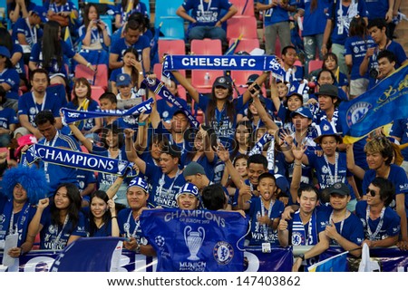 BANGKOK,THAILAND-JULY 17:Unidentified Thai fans hold Scarf supporters John Terry during a Chelsea FC training session at Rajamangala Stadium on July 17, 2013 in Bangkok, Thailand.