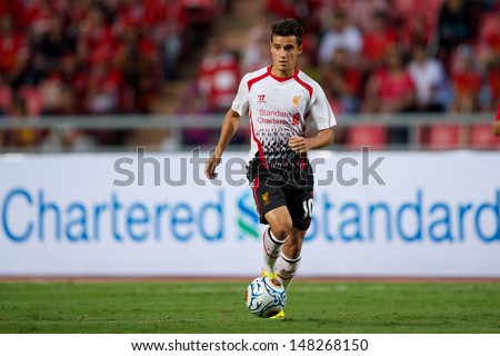 BANGKOK,THAILAND-JULY 28:Philippe Coutinho of Liverpool run with the ball during the international friendly match Thailand and Liverpool at the Rajamangala Stadium on July 28,2013 in,Thailand.