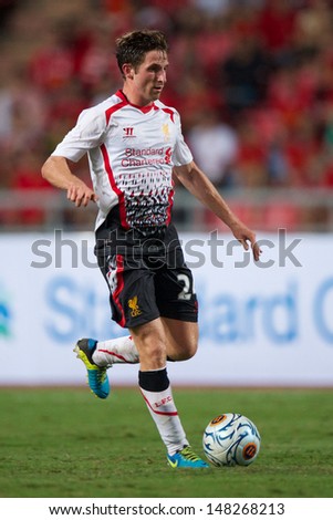 BANGKOK,THAILAND-JULY 28:Joe Allen of Liverpool run with the ball during the international friendly match Thailand and Liverpool at the Rajamangala Stadium on July 28,2013 in,Thailand.