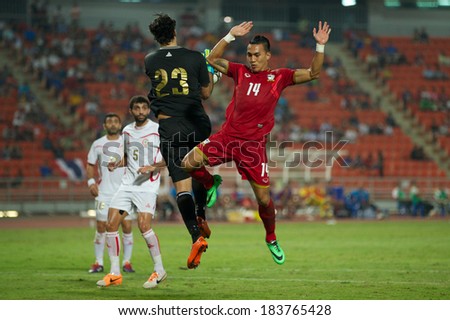 BANGKOK,THAILAND-MARCH: 05-Teeratep Winothai #14 of Thailand in action during the AFC Asian Cup 2015 Group B Qualifier between Thailand and Lebanon at Rajamangala Stadium on March5,2014 in,Thailand.