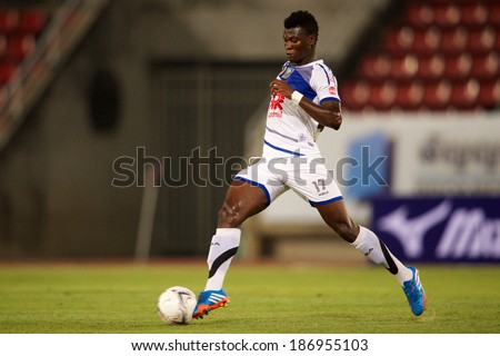 BANGKOK THAILAND-MARCH 09:Issac Honey of Air Force F.C. in action during Thai Premier League between Insee Police United.and Air Force F.C.at Thammasat Stadium on March 09, 2014,Thailand