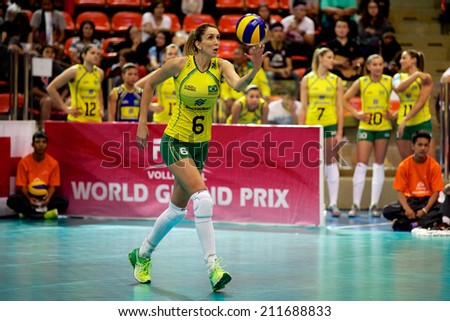 BANGKOK,THAILAND-AUGUST15:Thaisa	Menezes of USA Brazil  serves during the FIVB Women\'s World Grand Prix 2014  Brazil and USA at Indoor Stadium Huamark on Aug.15, 2014 in Thailand.