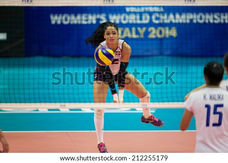 BANGKOK,THAILAND-AUGUST15:Brenda	Castillo of Dominican Republic receives the ball during the FIVB World Grand Prix Thailand and Dominican Republic at Indoor Stadium Huamark on Aug15,2014inThailand.