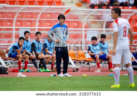 BANGKOK THAILAND-SEPTEMBER 17:Head Coach Choi Jin Cheul of  Korea Republic look on during the AFC U-16 Championship Korea Republic and Syria at Rajamangala Stadium on Sep17,2014,Thailand