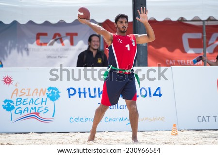 PHUKET,THAILAND-NOVEMBER 13:Fahad Albahri of Kuwait throws the football during Beach Flag Football Kuwait and India during the 2014 Asian Beach Games at Saphan Hin on Nov 13,2014 in Thailand.
