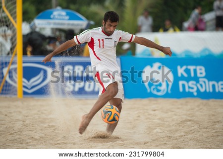 PHUKET THAILAND-NOVEMBER19:Mohammad Ahmadzadeh  of Iran in action during the Beach Soccer match between Thailand and Iran the 2014 Asian Beach Games at Saphan Hin on Nov 19,2014 in Thailand