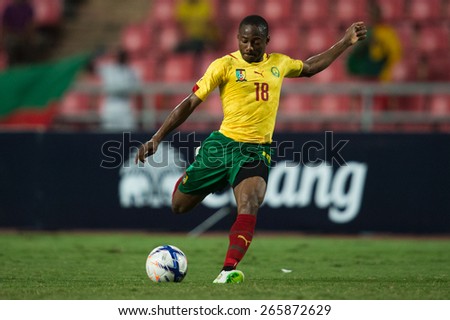 BANGKOK,THAILAND-MARCH 30:Eyong Enoh of Cameroon in action during the international friendly match between Thailand and Cameroon at Rajamangala Stadium on March30 2015 in,Thailand.