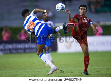 BANGKOK,THAILAND-July8:Tnan Chanabut no.18(RED) of Thailand All Stars in action during The Reading FC Thailand Tour 2015 Thailand All Stars and Reading FC at National Stadium on July 8, 2015,Thailand.