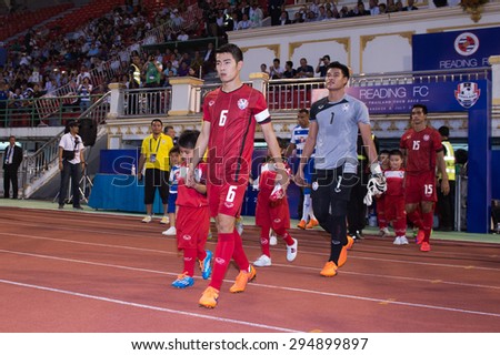 BANGKOK,THAILAND-July8:Sarach Yooyen no.6 of Thailand All Stars walk to stadium during The Reading FC Thailand Tour 2015 Thailand All Stars and Reading FC at National Stadium on July 8, 2015,Thailand.