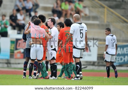 PATHUMTHANI,THAILAND-AUG,2:Former Liverpool Football Club and England striker.Robbie Fowler of MTUTD during in Toyota League Cup between KU and MTUTD at Thupatemee Stadium :Aug 2,2011.Pathumthani,Thailand.