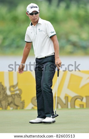 NAKHONPATHOM,THAILAND - AUG 11:Choi Jin-ho of KOR in action during day one of the 2011 Thailand Open at Suwan Golf&Country Club on August 11, 2011 in Nakhonpathom Thailand