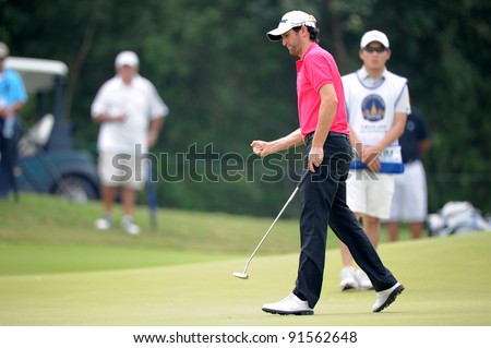 CHONBURI, THAILAND - DECEMBER 15:Gregory BOURDYof France plays a shot during day one of the Thailand Golf Championship at Amata Spring Country Club on December 15, 2011 in Chonburi, Thailand.