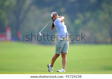 PATTAYA THAILAND-FEBRUARY 16: Ai Miyazato of Japan watches the ball after hits a shot during the first round of Honda LPGA  2012 on February 16,2012 at Siam Country Club Old Course in Pattaya,Thailand