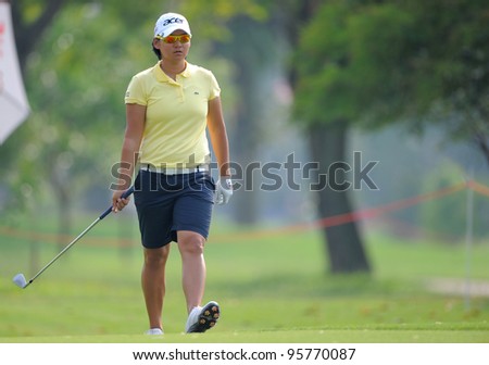 PATTAYA, THAILAND-FEBRUARY 16:Yani Tseng of Taiwan walks towards during hole17 the first round the Honda LPGA 2012 on February 16,2012 at Siam Country Club Old Course in Pattaya,Thailand