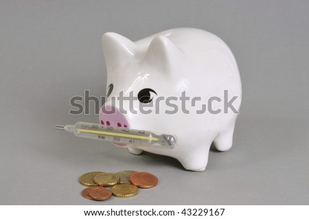 moneybox with clinical thermometer and euro-coins