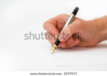 feather during writing keaping by hand