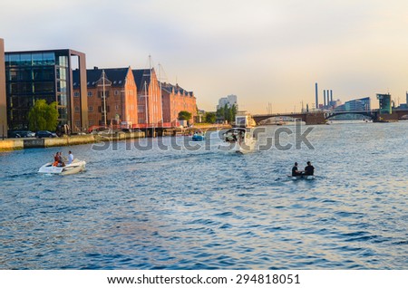Copenhagen, Denmark. A channel Havnebade with people on boats