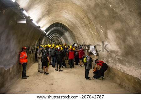 MAUTHAUSEN,AUSTRIA-MAY 10,2014:people with helmet visit the Gusen tunnel,a serie of secret tunnels near the concentration camp of mauthausen