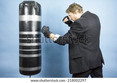 Business man preparing to fight in the world of finance